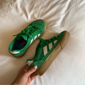 Green adidas sneakers